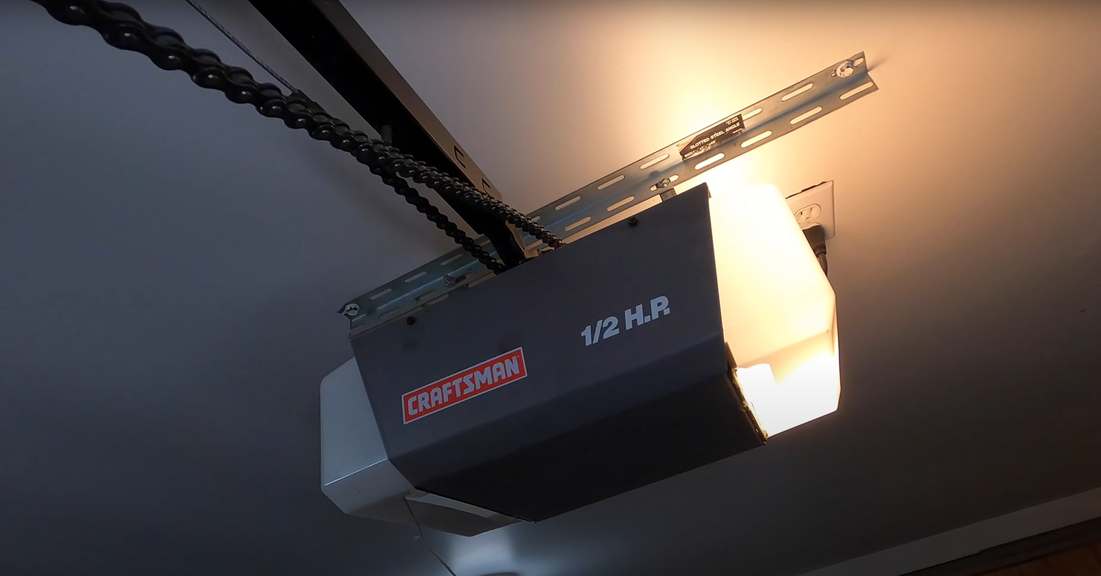 Expert technician conducting a garage door opener repair at Garage Door Services Osprey