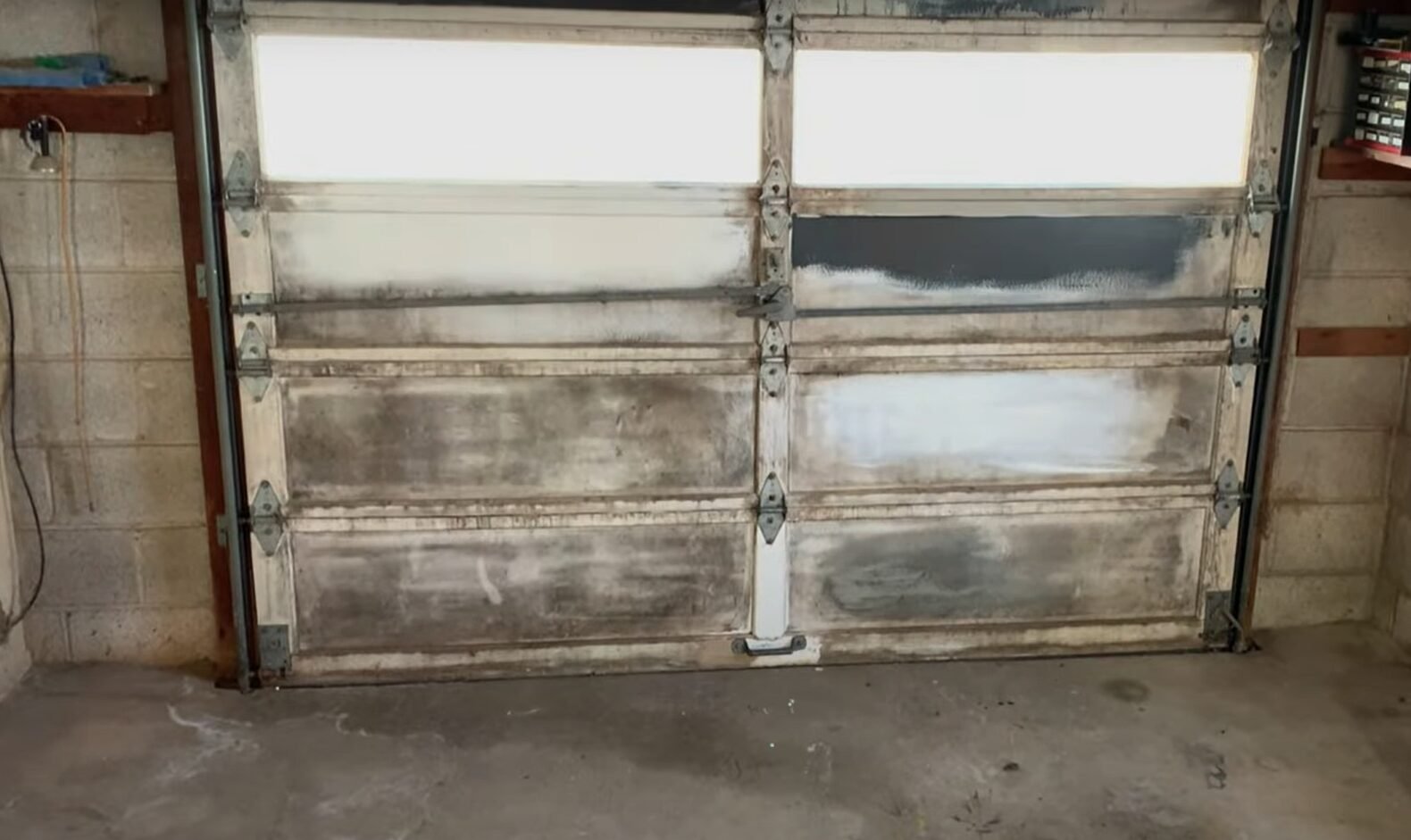 Professional technician providing expert garage door repair service in Osprey, ensuring safety and efficiency for residential and commercial properties.