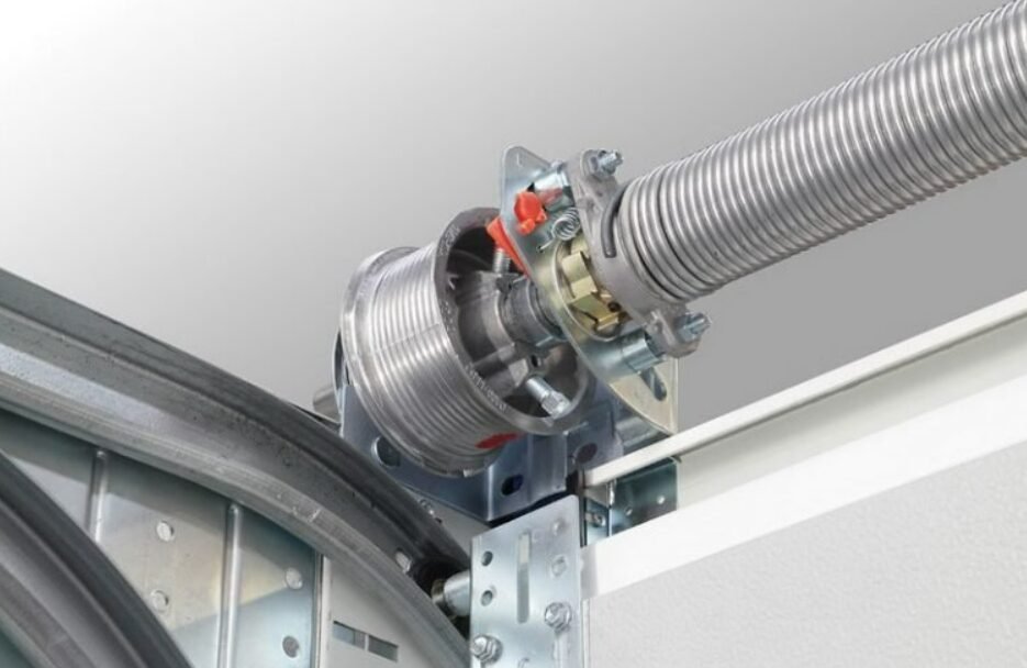 Close-up of a professional technician conducting garage door spring repair on a residential garage, showcasing tools and precision in the repair process, at Garage Door Services Osprey.